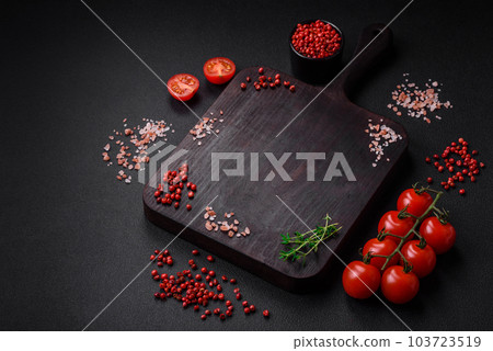 Ingredients for cooking cherry tomatoes, salt, spices and herbs 103723519