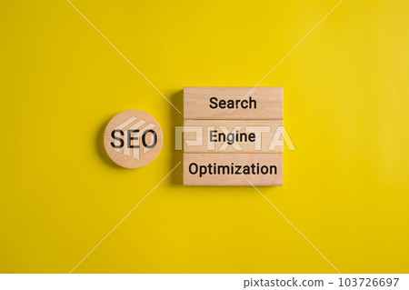 SEO text on wooden cube, Search engine optimization ranking, SEO 103726697