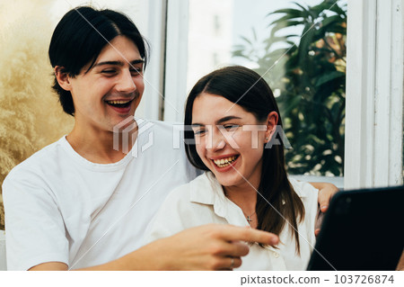Couple of romantic young people at home, Vintage style photo 103726874