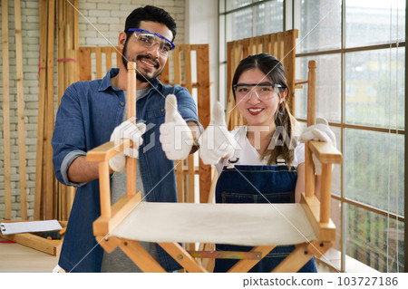 Professional carpenter with handicraft working in carpentry shop Professional carpenter with handicraft working in carpentry shop 103727186