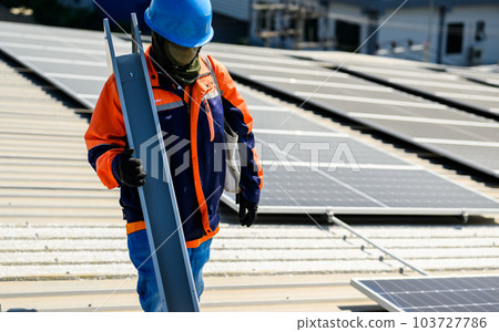 Maintenance worker working with solar power at solar cell farm Maintenance worker working with solar power at solar cell farm 103727786