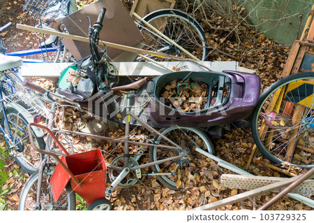Broken and discarded bicycles and motorbikes Broken and discarded bicycles and motorbikes 103729325