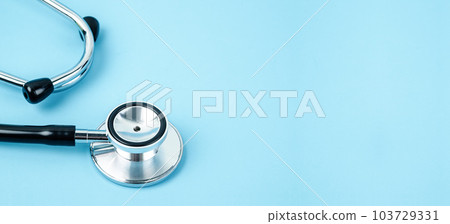 A medicine equipment stethoscope or phonendoscope isolated on trendy pastel blue background. 103729331