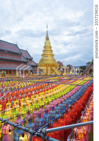 The Wat Phra That Hariphunchai pagoda with light Festival at Lamphun, Thailand. The Wat Phra That Hariphunchai pagoda with light Festival at Lamphun, Thailand. 103729816