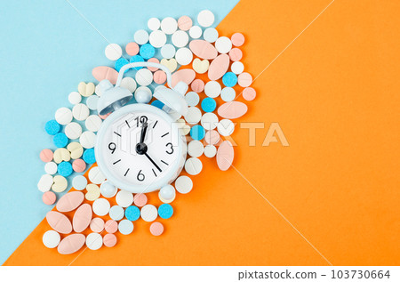 The Alarm clock and many drug. Taking medicine at the right time concepts. The Alarm clock and many drug. Taking medicine at the right time concepts. 103730664