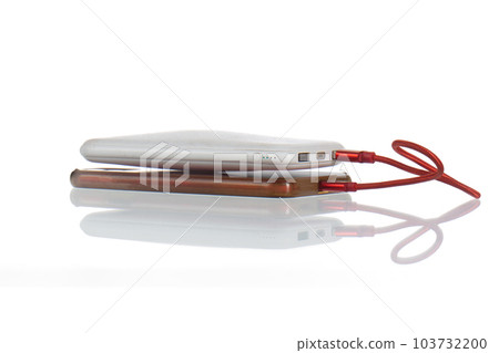 Swollen powerbank with usb cable for charger mobile phone  , isolated on white background 103732200