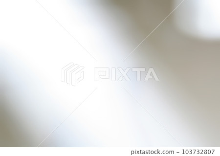 Abstract texture blown out by strong light on a gray background Abstract texture blown out by strong light on a gray background 103732807