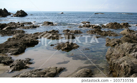 Clear waters and rocky shores 103733556