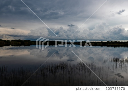 Dark storm clouds over Nine Mile Pond in Everglades National Park, Florida. Dark storm clouds over Nine Mile Pond in Everglades National Park, Florida. 103733670