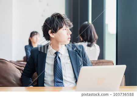 Salesman skipping work in a cafe 103736588