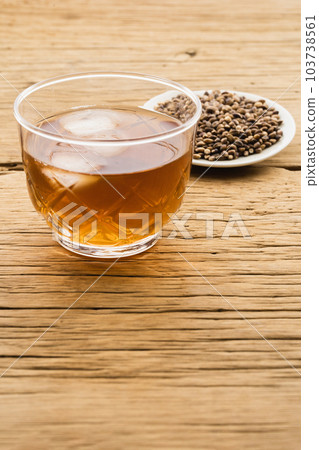 Mochi barley and barley tea served on a small plate (natural taste) Mochi barley and barley tea served on a small plate (natural taste) 103738561