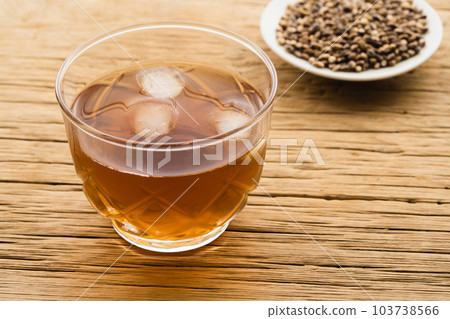 Mochi barley and barley tea served on a small plate (natural taste) Mochi barley and barley tea served on a small plate (natural taste) 103738566
