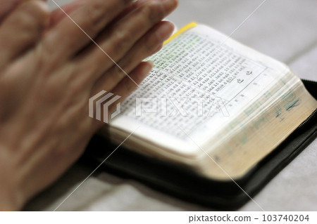 Old Korean Bible book and prayer concept shooting, Old Bible book that is difficult to find Old Korean Bible book and prayer concept shooting, Old Bible book that is difficult to find 103740204