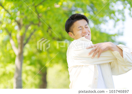 Photo of a man stretching Photo of a man stretching 103740897