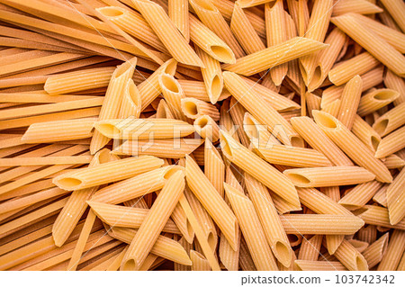 Detail of Italian pasta mix spaghetti and penne Detail of Italian pasta mix spaghetti and penne 103742342