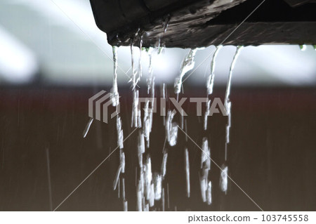 Water dripping from rain gutters June rainy season Water dripping from rain gutters June rainy season 103745558