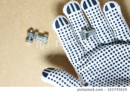 work gloves and bolts 103745629