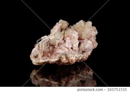 Macro mineral stone Pink Amethyst on a black background 103751535