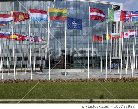Brussels, Belgium - February 19, 2022: NATO Headquarters, political and administrative centre of the Alliance Brussels, Belgium - February 19, 2022: NATO Headquarters, political and administrative centre of the Alliance 103752988