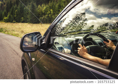 car for traveling with a mountain road 103753125