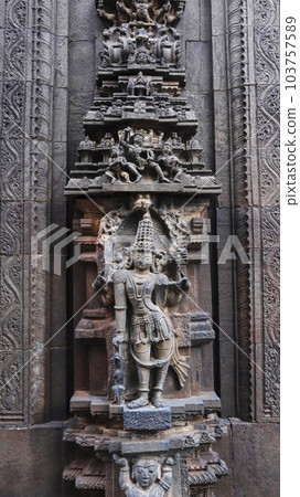 Carved  sculpture on the Entrance Wall of Bugga Ramlingeswara Temple, Tadipatri, Andhra Pradesh, India. 103757589
