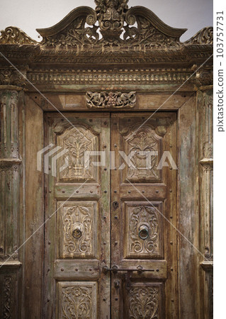 old wooden carved Indian door doorway old wooden carved Indian door doorway 103757731