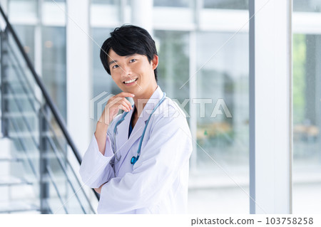 Young male doctor 103758258