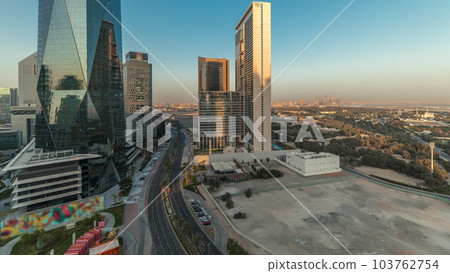 Panorama showing Dubai International Financial district aerial timelapse. View of business and financial office towers. Panorama showing Dubai International Financial district aerial timelapse. View of business and financial office towers. 103762754