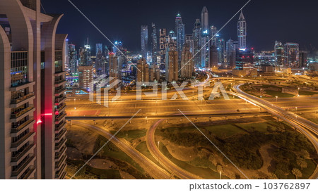 Dubai Marina highway intersection spaghetti junction night timelapse 103762897