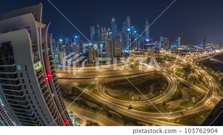 Dubai Marina highway intersection spaghetti junction all night timelapse Dubai Marina highway intersection spaghetti junction all night timelapse 103762904