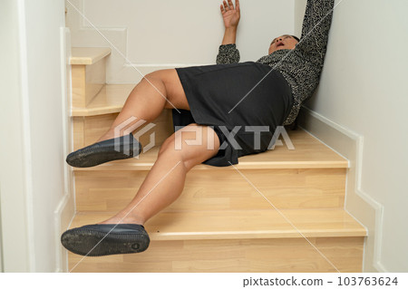 Asian lady woman patient fall down the stairs because slippery surfaces. Asian lady woman patient fall down the stairs because slippery surfaces. 103763624