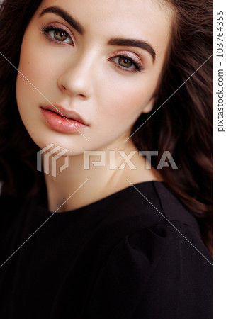 Beautiful woman face close up healthy skin care. Beautiful woman face close up healthy skin care. 103764355