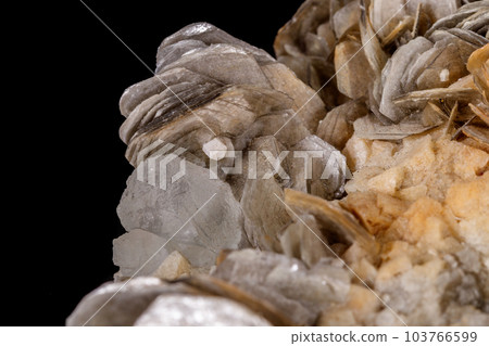 macro mineral stone Topaz on a black background macro mineral stone Topaz on a black background 103766599