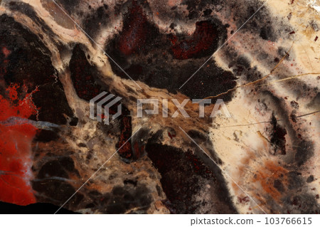 macro stone mineral jasper on black background macro stone mineral jasper on black background 103766615