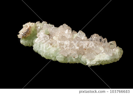 Macro mineral stone Prehnite quartz on a black background 103766683