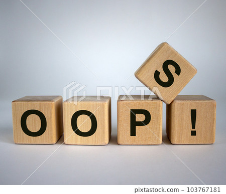 Oops sign on wooden cubes. Beautiful white background, copy space. Concept. 103767181
