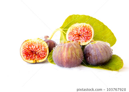 Fig isolated on white background. Fig macro. Fresh fruits with leaf isolated on white background Fig isolated on white background. Fig macro. Fresh fruits with leaf isolated on white background 103767928