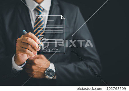 Businessman's hand uses a stylus pen to sign electronic documents online. Highlights the online signing process, digital document management, and the paperless concept. Agreement is established. Businessman's hand uses a stylus pen to sign electronic documents online. Highlights the online signing process, digital document management, and the paperless concept. Agreement is established. 103768509
