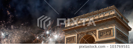 Celebratory colorful fireworks over the Arc de Triomphe, Paris, France 103769581