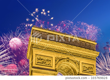 Celebratory colorful fireworks over the Arc de Triomphe, Paris, France 103769828