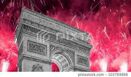 Celebratory colorful fireworks over the Arc de Triomphe, Paris, France. The walls of the arch are engraved with the names of 128 battles and names of 660 French military leaders (in French) Celebratory colorful fireworks over the Arc de Triomphe, Paris, France. The walls of the arch are engraved with the names of 128 battles and names of 660 French military leaders (in French) 103769866