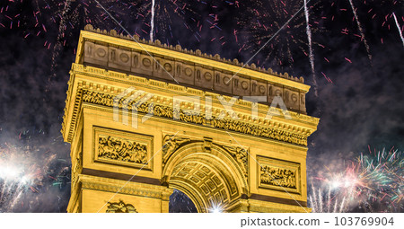 Celebratory colorful fireworks over the Arc de Triomphe, Paris, France 103769904