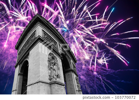 Celebratory colorful fireworks over the Arc de Triomphe, Paris, France 103770072