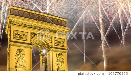 Celebratory colorful fireworks over the Arc de Triomphe, Paris, France 103770333