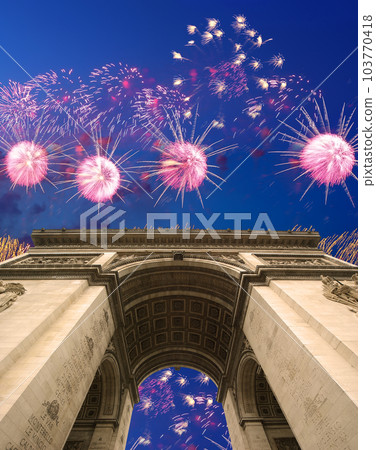 Celebratory colorful fireworks over the Arc de Triomphe, Paris, France Celebratory colorful fireworks over the Arc de Triomphe, Paris, France 103770418