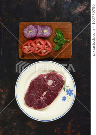 Patagonian lamb meat presented on the wooden table, Patagonia Argentina. 103770790