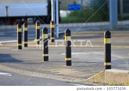 Image of a car stop for intersection safety measures Image of a car stop for intersection safety measures 103771036