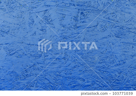Blue paint chipboard abstract pattern surface pressed wood plywood texture particleboard background Blue paint chipboard abstract pattern surface pressed wood plywood texture particleboard background 103771039