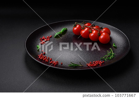 Ingredients for cooking cherry tomatoes, salt, spices and herbs 103771667