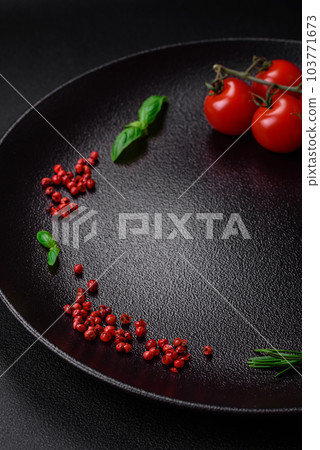 Ingredients for cooking cherry tomatoes, salt, spices and herbs Ingredients for cooking cherry tomatoes, salt, spices and herbs 103771673